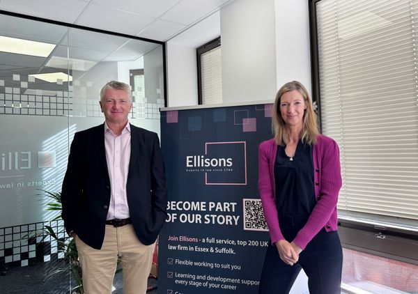 Two people in office room