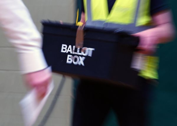 Ballot box being taken away