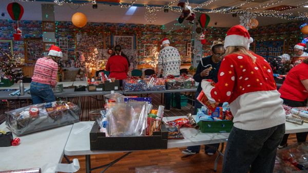 Wrapping Christmas parcels at Ipswich Family Bank
