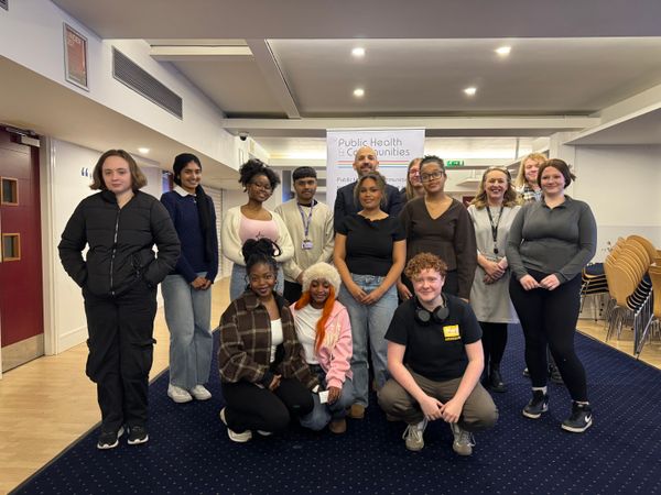 Group of young people in room