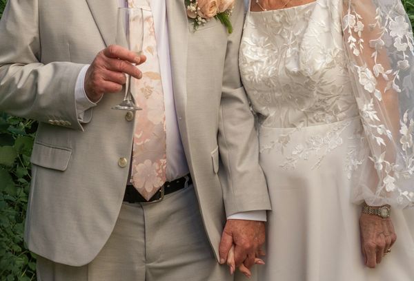 An elderly couple getting married