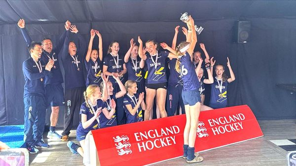 Ipswich Hockey Club U14s lift the trophy