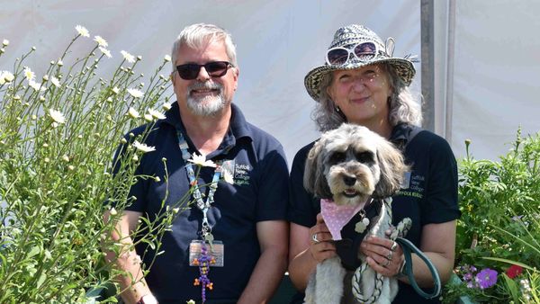 Mark James and Sarah Brunning with Maisie in the sustainable garden