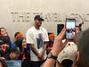 Carmelo Anthony poses with fans at Travel Agency Fifth Avenue.