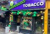 A closed weed bodega storefront in the East Village, decorated for its "grand opening."