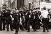 A crowd of NYPD officers milling about