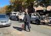 An NYPD officer removes the boy's scooter and backpack from the scene.