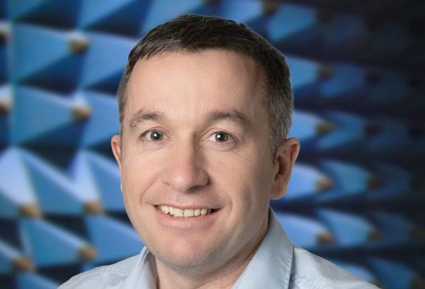 How Learning to Cooperate Expands Mobile Broadband Access