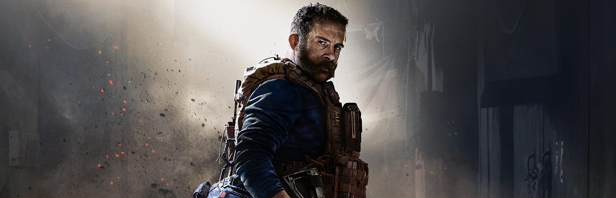 게임 『ᅟCall of Duty: Modern Warfare』의 콘셉트 아트. 먼지가 날리는 어두운 창고에 일부 빛이 내리쬐는 배경으로, 구레나룻이 콧수염으로 이어지고 전술 조끼를 입은 남성이 이쪽을 보는 모습.