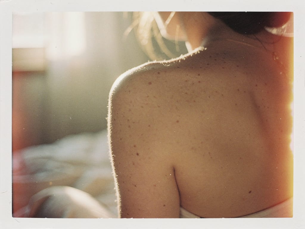Close-up of aging skin texture in soft natural light