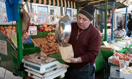 Tony the greengrocer on his stall, Broadway Market