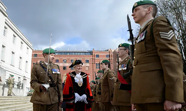 Speaker Rosemary Sales greets the battalion
