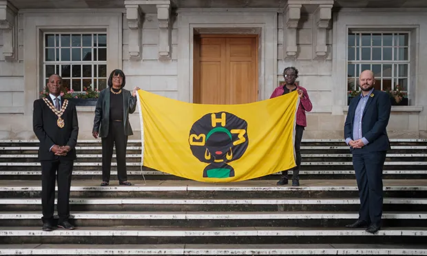 Local politicians lift Black History flag over Hackney Town Hall