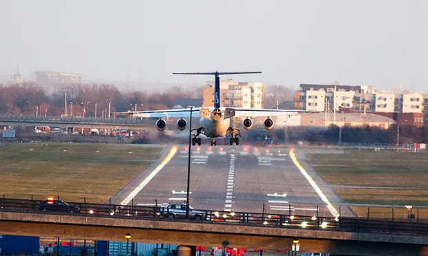 Bumpy ride?: A plane lands at London City Airport. Photograph: Matt Biddulph (Creative Commons)