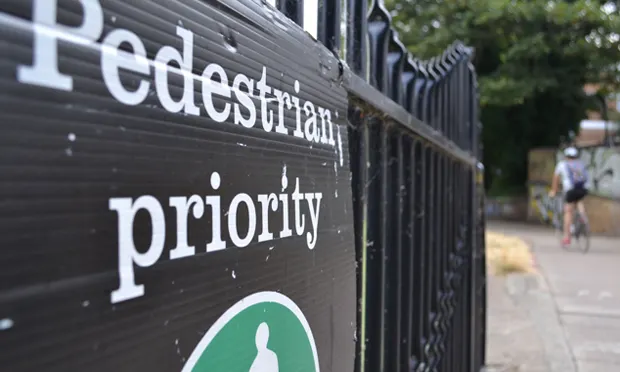Cycling is permitted on the towpath, though pedestrians have priority. Photographs: Josh Loeb