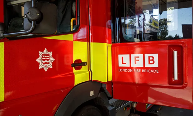 Woman taken to hospital after major fire in Dalston