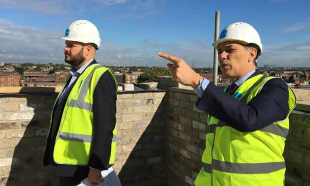 Glanville donned the hi-vis for his visit to an 'affordable development' in Homerton, run by developers Pocket. Photograph: C