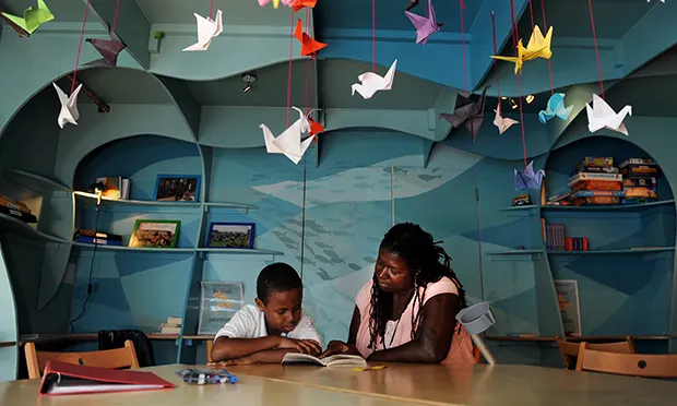 As easy as A-B-Sea: Annushka and Abas read together at Hackney Pirates. Photograph: Hackney Pirates