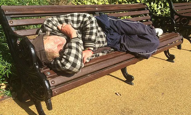 Homeless man on bench