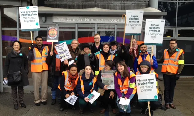 Striking doctors gather for a group picture outside Homerton Hospital. Photograph: Coral Jones