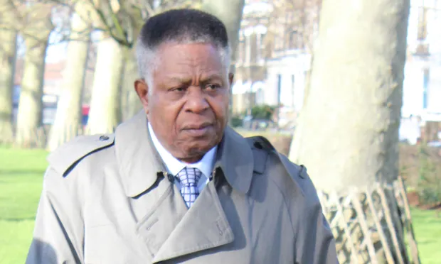 Remembrance: John Burke-Monerville plants a tree on Hackney Downs for his son Joseph. Photograph: Nell Lewis