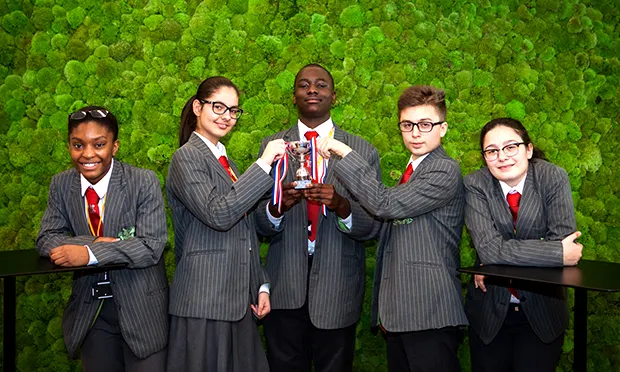 Skinners' Academy students pose with trophy