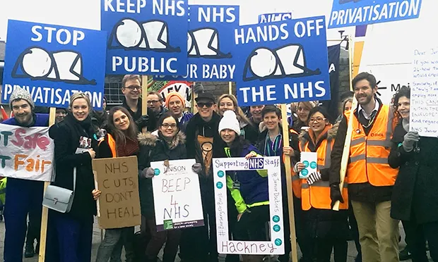 Artist Stik (centre) with protesters outside Homerton Hospital. Photograph: Hackney Citizen