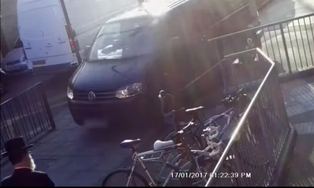 A video still shows a vehicle driving over the pavement in Oldhill Street