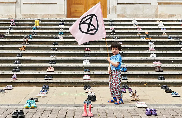 Extinction Rebellion lays hundreds of children’s shoes outside Hackney Town Hall for climate change protest