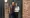 Richard and Anna Bell stand in front of their Hackney home.
