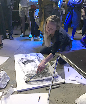 Against the clock: an Art Battle participant at work. Photograph: Carlotta Goulden