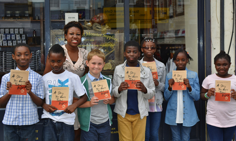 The pen is mightier: Ministry of Stories authors brandish copies of their book