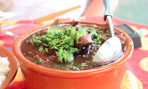 'Heaving peasant hotpot': a bowl of feijoada. Photograph: Helder Ribeiro via Flickr