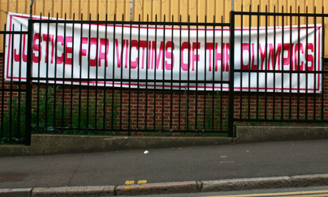 Justice for victims of the Olympics banner 