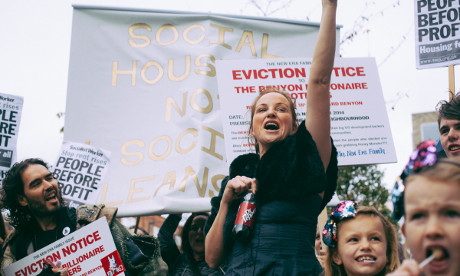 New Era estate Danielle Molinari with Russell Brand at the New Era protest march. Photograph: Greg Holland