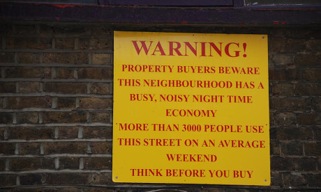 Sign on Rivington Street warning potential buyers.