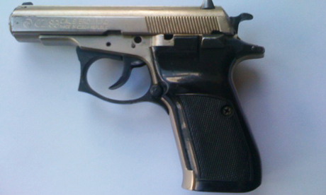The semi-automatic pistol discovered in Woods bag