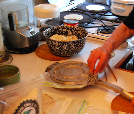 Gillian Riley gets to grips with a Mexican tortilla press. Photograph: Annalies Winny
