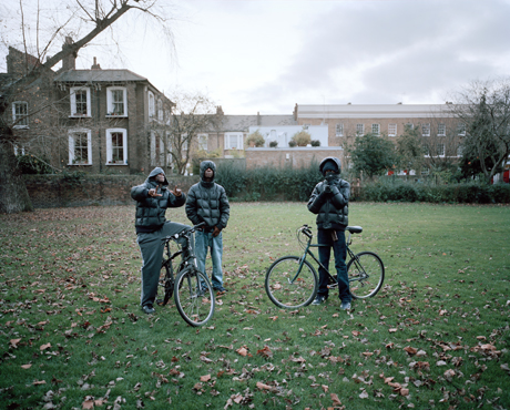 From the series: "Hackney - A Tale of Two Cities" Zed Nelson, Youths in London Fields, Hackney. November 2011.