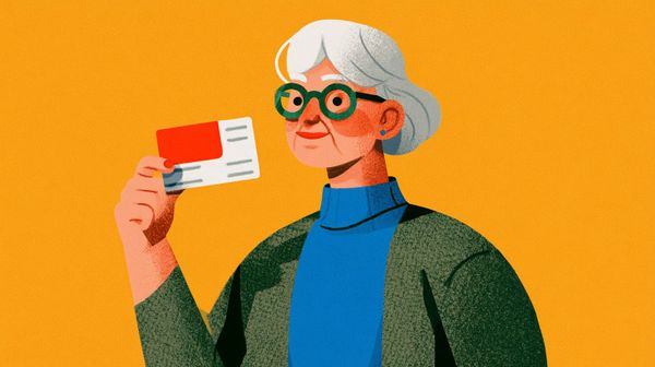 image of a senior holding a Medicare card