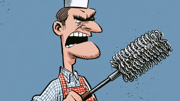 image of a chef with a grill brush