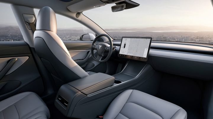 Tesla crashes into house, kills woman; feds investigating