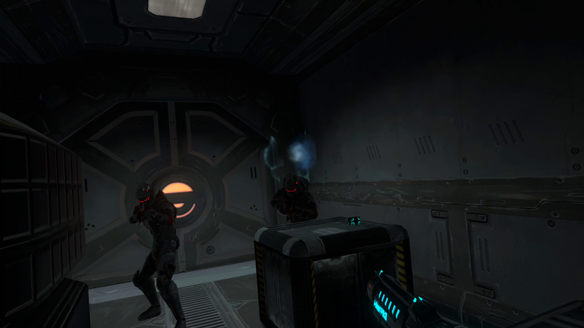 Two military grunts in full combat suits with red helmet lights engage the player, who is firing their energy pistol at them. There's a locked door behind the guards, one of which is hiding behind a crate.