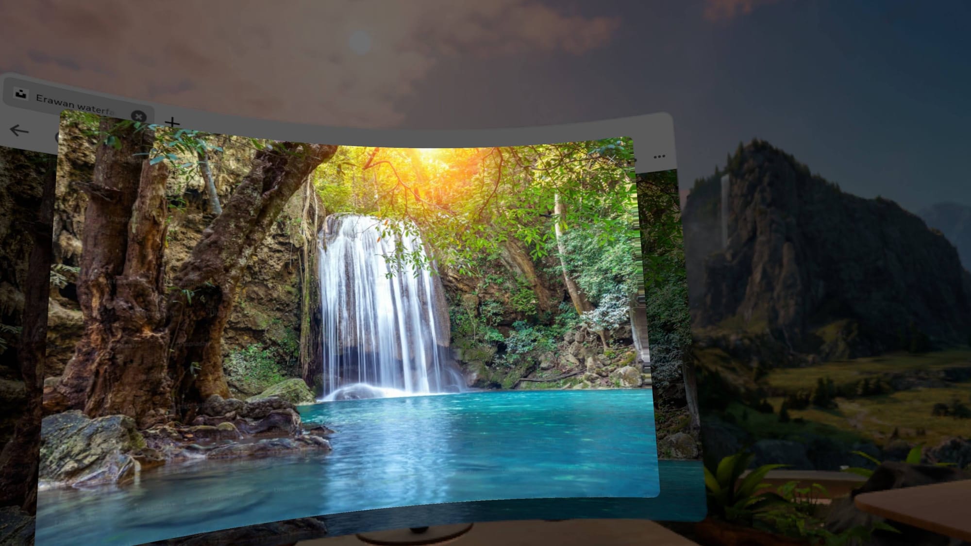 A 2D waterfall photo from Unsplash hovers in front of my browser in 3D.