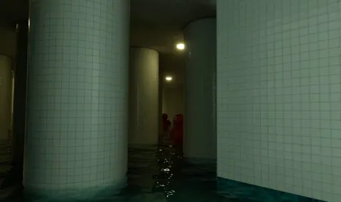 A liminal pools/backroom map with some giant rubber duckies staring at the viewer