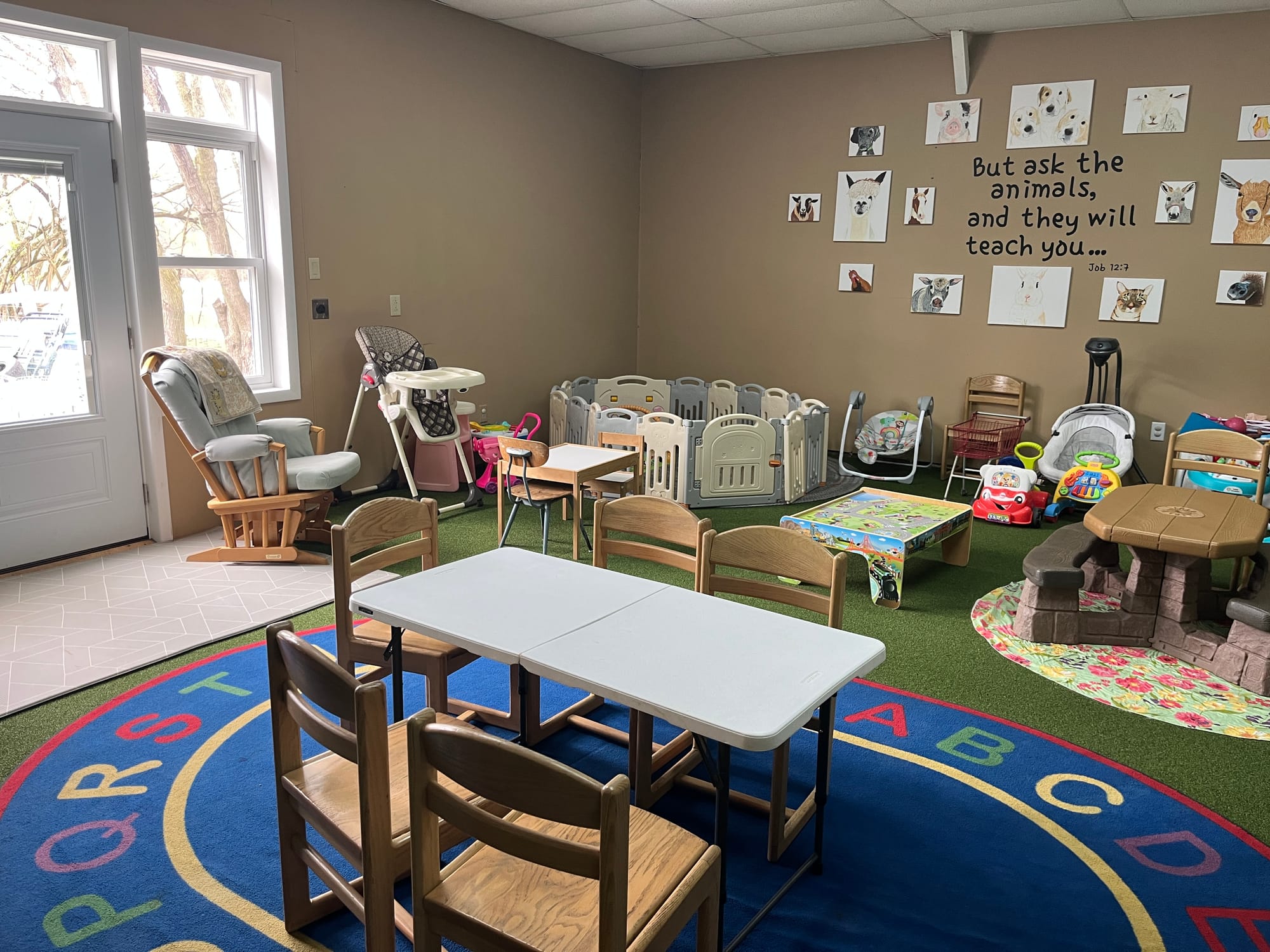 A classroom filled with a variety of small chairs for children