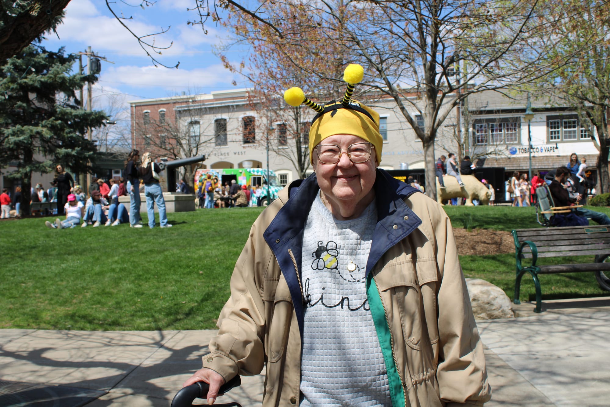 Cyndy Jividen wears a bumblebee shirt and hat with antennae