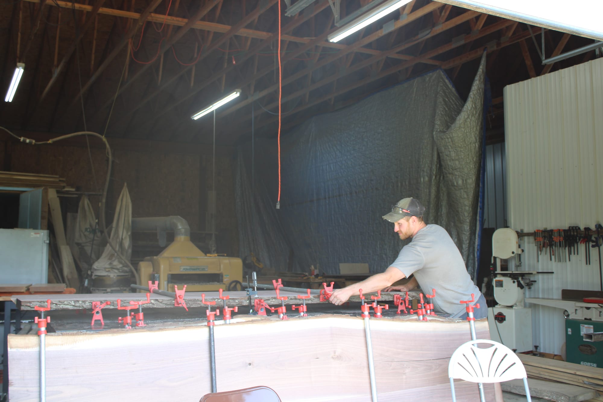 Ryan Murphy cleans up the warehouse.