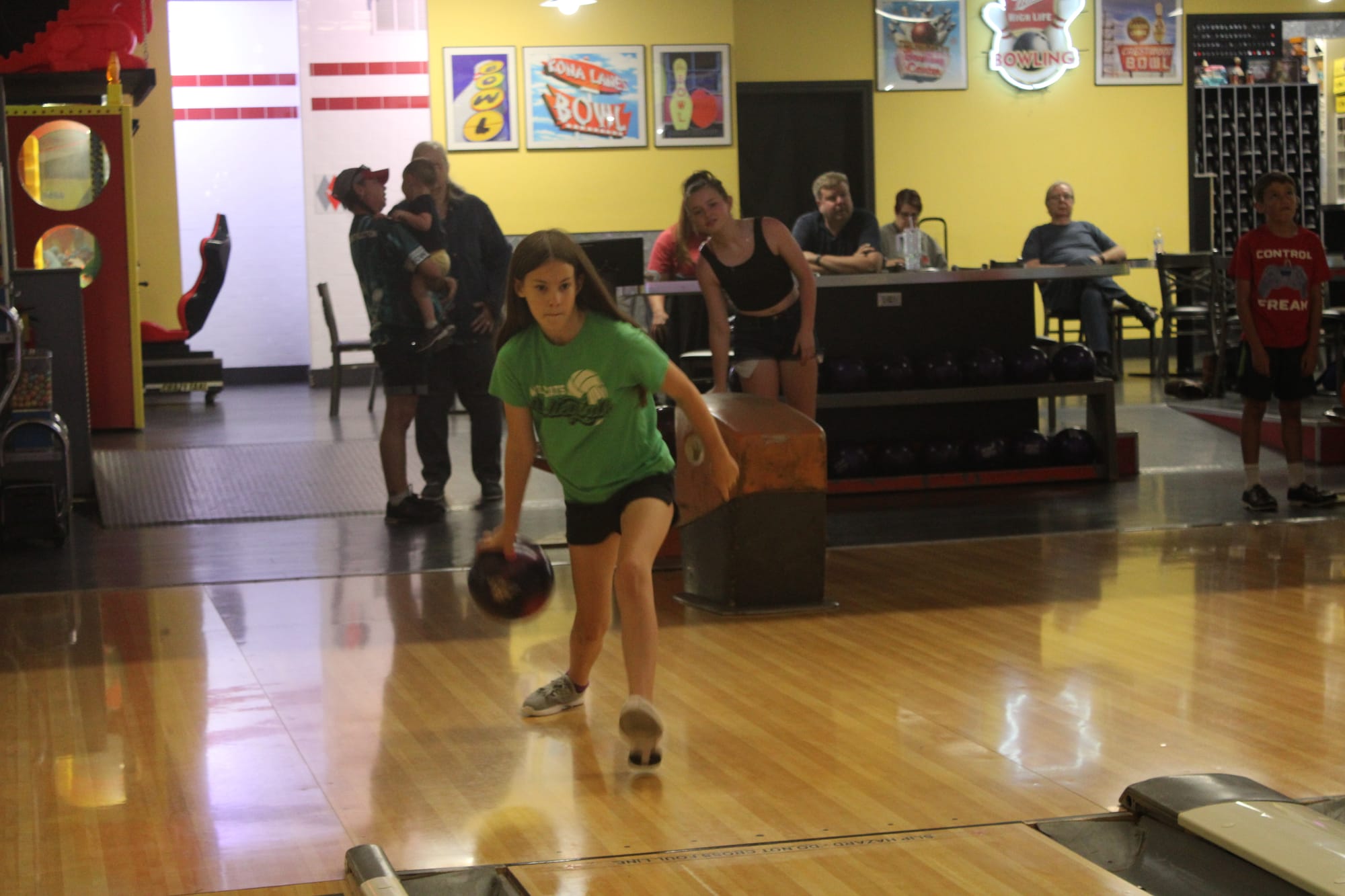 The bowlers at Generation Gap cheer each other on