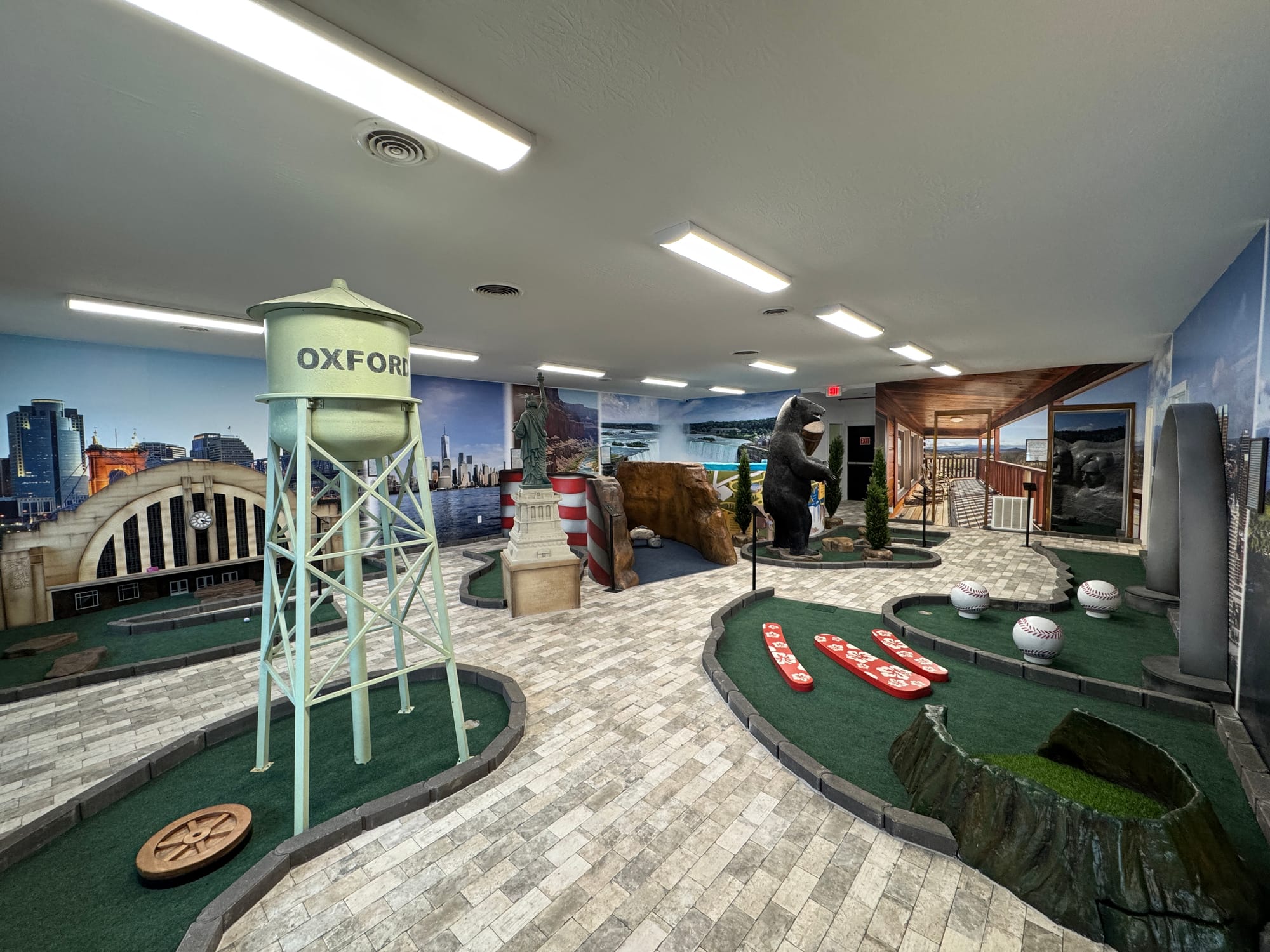 The nine-hole mini golf course features both local monuments like the Oxford water tower as well as national monuments like the Statue of Liberty.